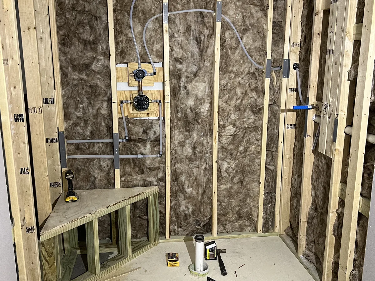 Shower opening framed in wood before waterproofing and tile
